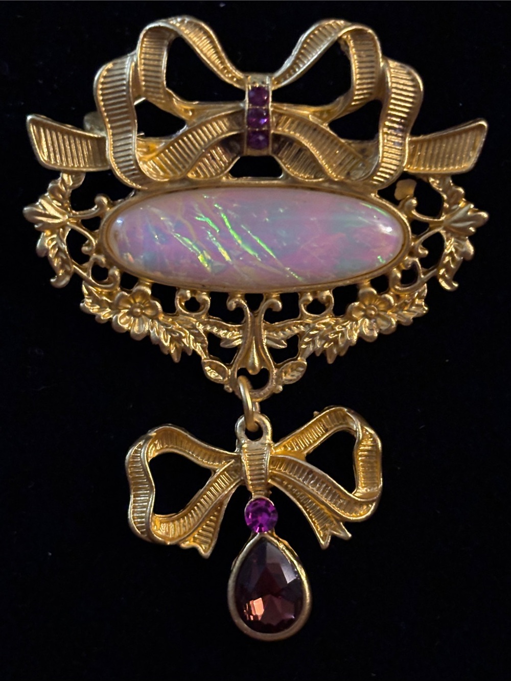 Gold-Tone Bow Drop Brooch with Pink Opalescent Stone and Purple Accents